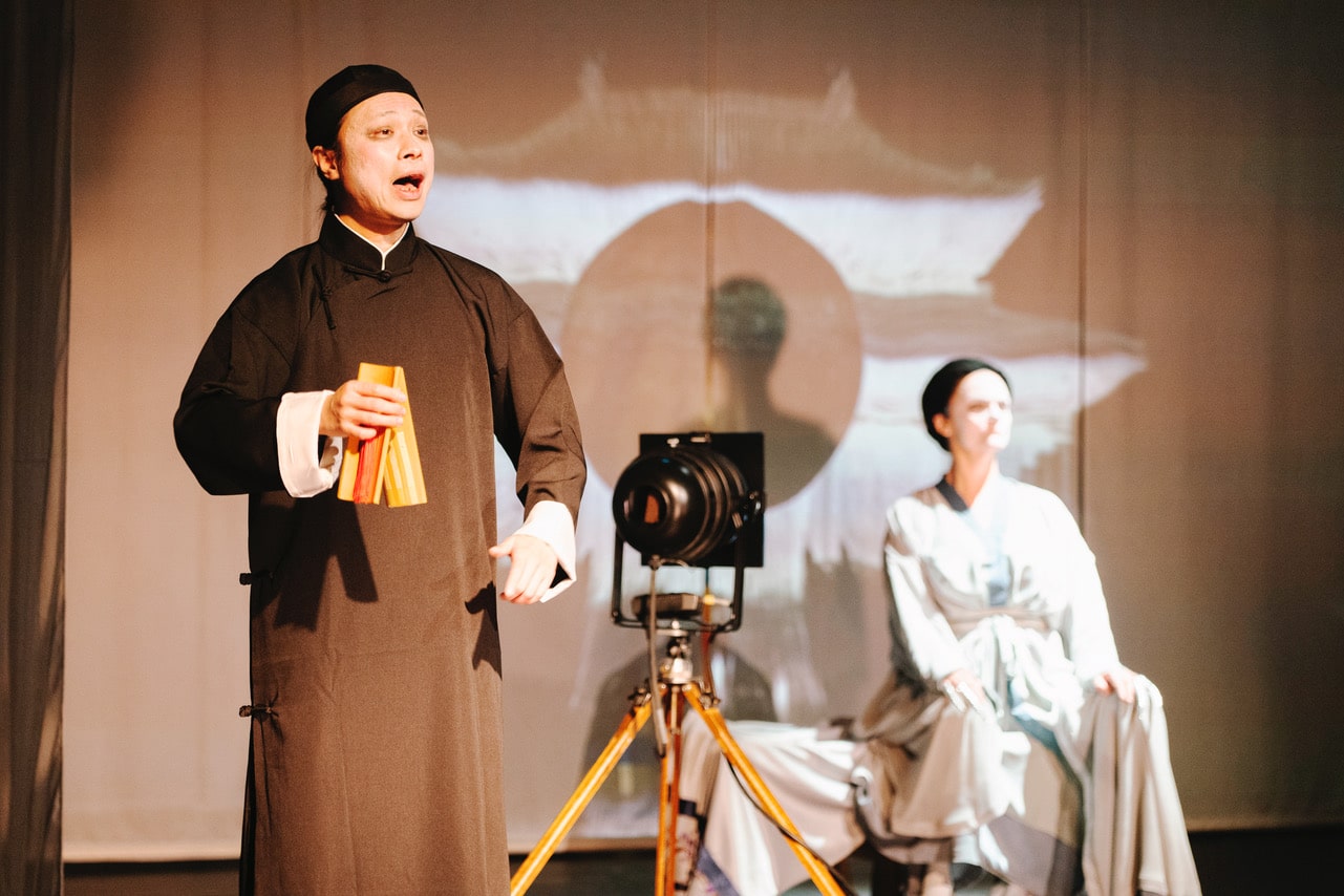 Two actors in a scene from Nara Opera